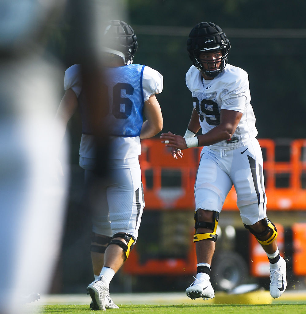 Missouri defensive end Chris Turner lines up for a drill